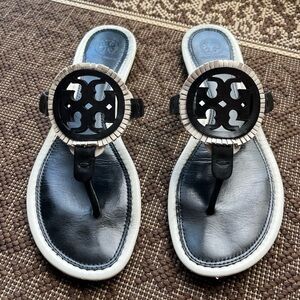 Tory Burch womens miller leather sandalsls
W/ fringe, white & black size 9